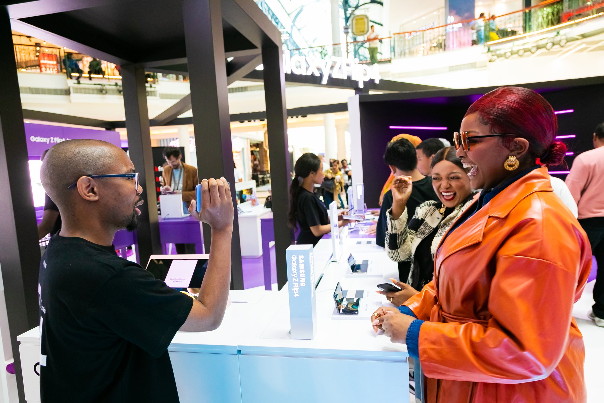 customer-shopping-for-mobile-phone-in-retail-store-2025-01-31-22-31-27-utc