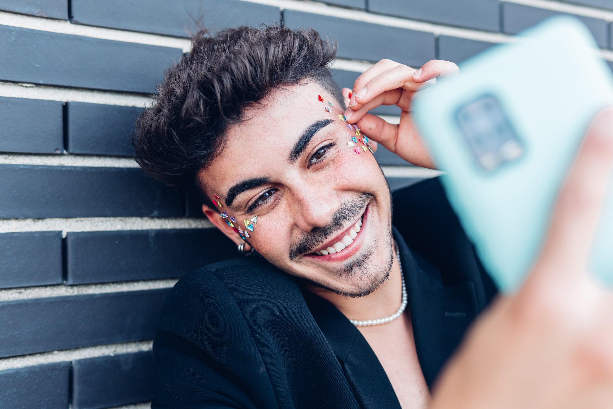 happy-gay-man-taking-selfie-on-smartphone-2025-01-09-12-42-41-utc happy-gay-man-taking-selfie-on-smartphone-2025-01-09-12-42-41-utc